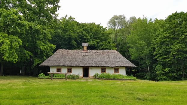 Ukraine, Kiev - June 11, 2020. The old house of peasants in the museum Pirogovo. National Museum of Folk Architecture and Everyday Life of Traditional Folklore Houses of Different Regions of Ukraine.