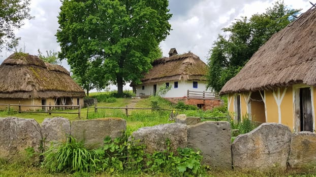 Ukraine, Kiev - June 11, 2020. The old house of peasants in the museum Pirogovo. National Museum of Folk Architecture and Everyday Life of Traditional Folklore Houses of Different Regions of Ukraine.