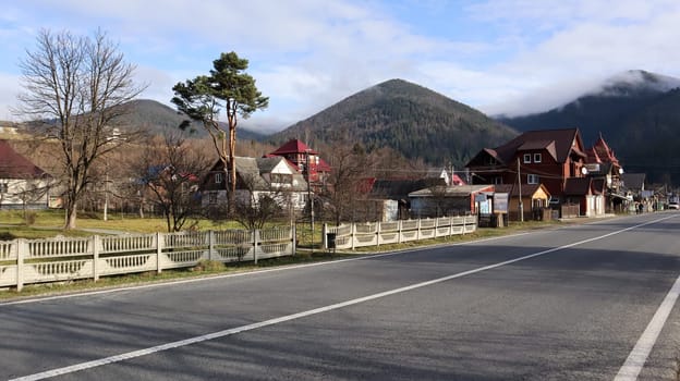 A small town or village of Yaremche among the Carpathians on an autumn afternoon. Ukraine, Yaremche - November 20, 2019