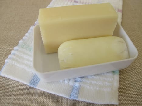 A new soap and a a used soap bar