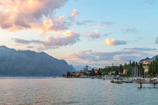 Beautiful evening scenery with cute little village, lago di garda, Italy
