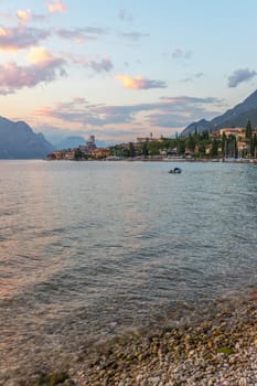 Landscape in Italy: Sunset at lago di garda, Malcesine: Lake, Clouds and village