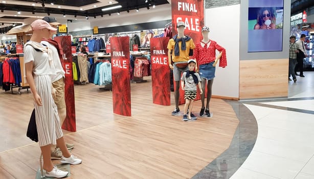 Ukraine, Kiev - September 04, 2019. Sale signs in a shop window in a shopping center on the day of shopping and the international holiday Black Friday, sale and discounts in clothing boutiques.