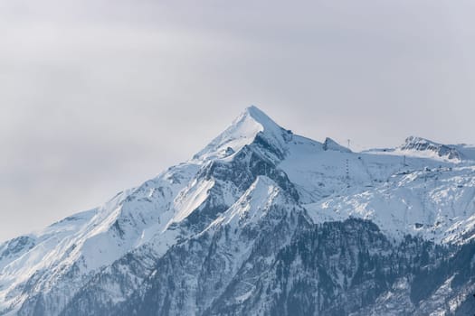Snowy Kitzsteinhorn in winter, ski lift, Austria