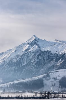 Snowy Kitzsteinhorn in winter, ski lift, Austria