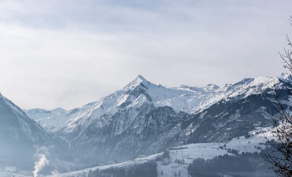 Snowy Kitzsteinhorn in winter, ski lift, Austria