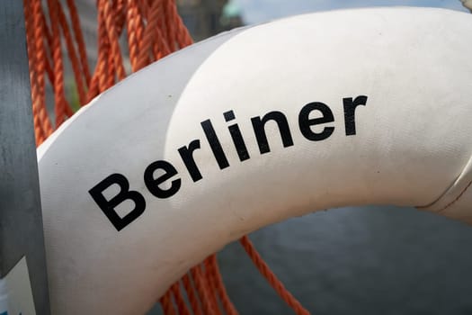 Detail of the lettering Berlin fire department (Berliner Feuerwehr) on a life ring on a bridge in Berlin