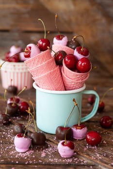 Chocolate covered cherries with pink sugar sprinkles