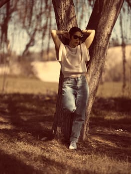 Fashion woman outdoor in spring scenery
