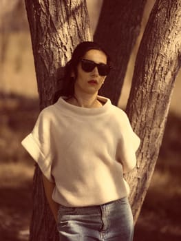 Fashion woman outdoor in spring scenery