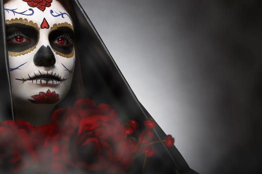 Portrait of a girl with sugar skull makeup. Calavera Catrina. Dia de los muertos. Day of The Dead. Halloween.