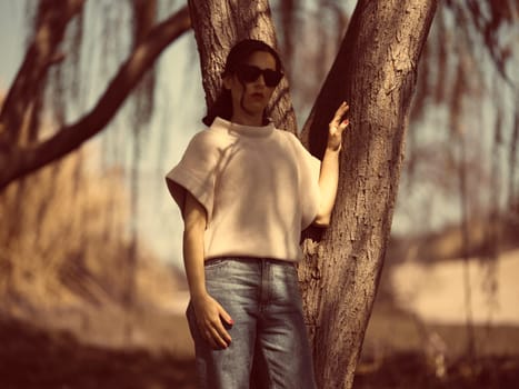 Fashion woman outdoor in spring scenery