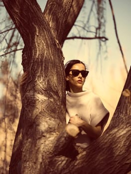 Fashion woman outdoor in spring scenery