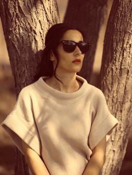 Fashion woman outdoor in spring scenery