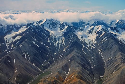Aerial View of Alpine Glaciers Cut in Remote Mountains in Denali National Park in Alaska