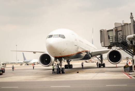 Airplane near the terminal in an airport cockpit
