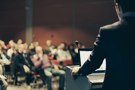 Speaker at Business Conference and Presentation. Audience at the conference hall.