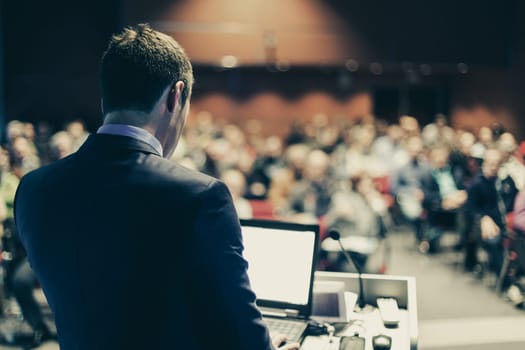 Speaker at Business Conference and Presentation. Audience at the conference hall.