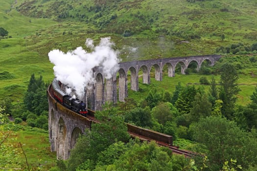 The steam locomotive on the famous Glenfinnan Viaduct in Scotland