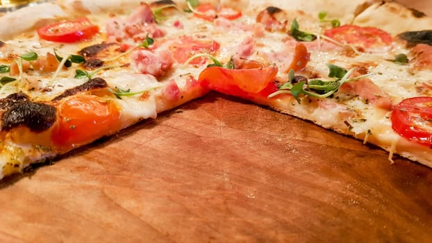 pepperoni pizza on a wooden board with empty space, copy space. Pizza without three slices.
