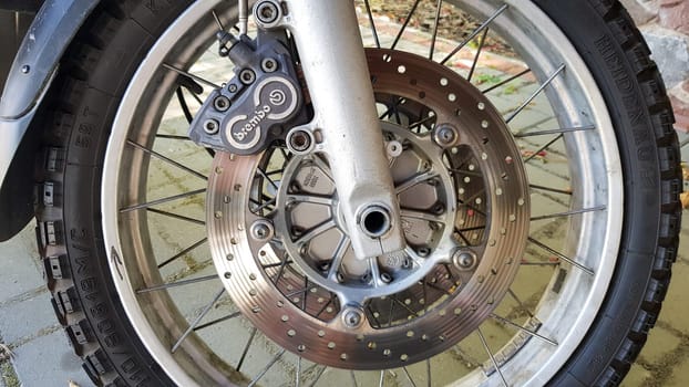 Ukraine, Kiev - September 10, 2019: front wheel and brake system of a BMW motorcycle.
