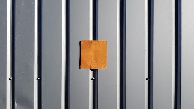 Metal sheet for roofing and background wall. Curve metal texture, table of steel sheet. Selective focus Texture for art backdrop add text or graphic design. Corrugated metal sheet door in silver.