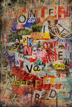 Grunge textured background with old torn newspapers
