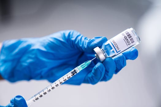 selective focus on hand using sars-cov-2 vaccine