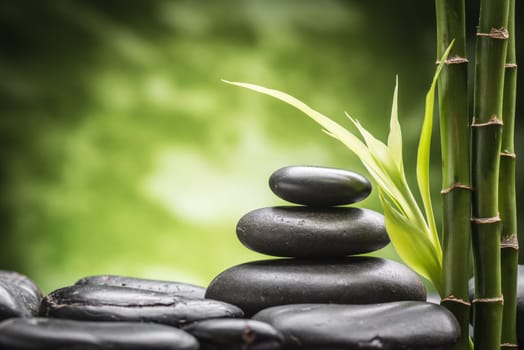 still life with zen basalt stones and bamboo