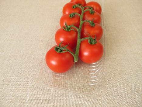 Tomatoes in a plastic package, plastic tray