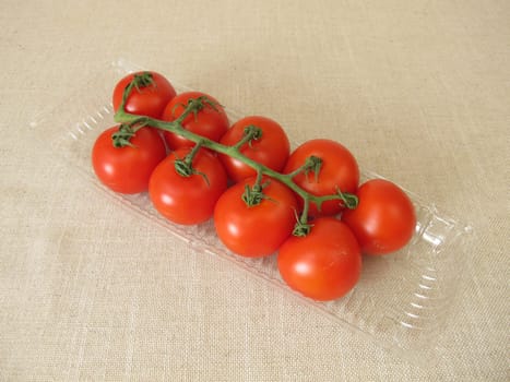 Tomatoes in a plastic package, plastic tray