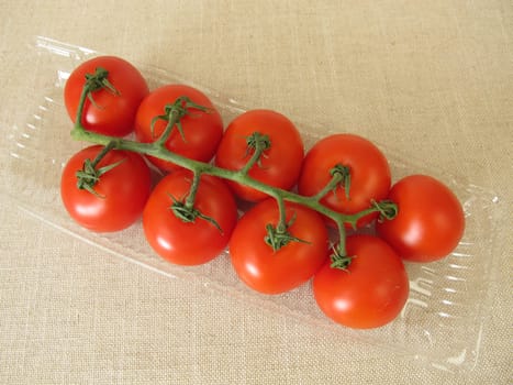 Tomatoes in a plastic package, plastic tray