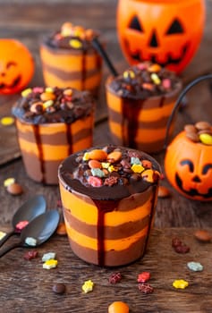 Colorful pudding dessert with sugar sprinkles for Halloween