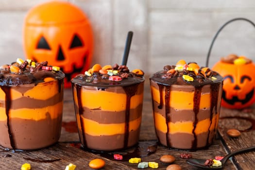 Colorful pudding dessert with sugar sprinkles for Halloween