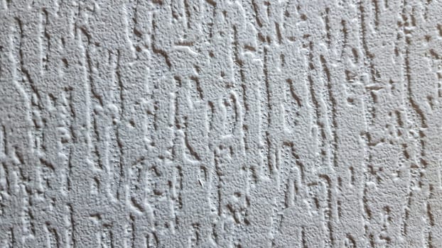 Texture of gray decorative plaster or concrete. Abstract background for design. Decorative plaster effect on wall