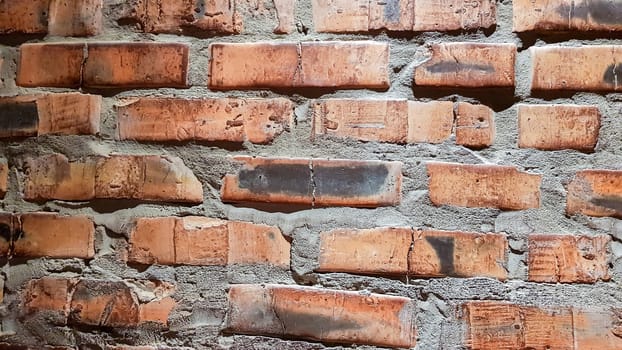 Vintage brick wall background. The red clay brick is beautiful, strong,suitable for decoration as a folk wall, used as a background image