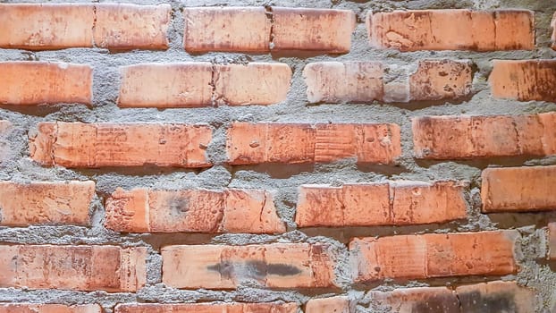 Vintage brick wall background. The red clay brick is beautiful, strong,suitable for decoration as a folk wall, used as a background image
