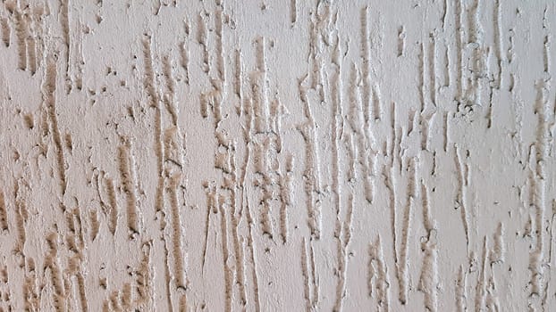 Texture of gray decorative plaster or concrete. Abstract background for design. Decorative plaster effect on wall
