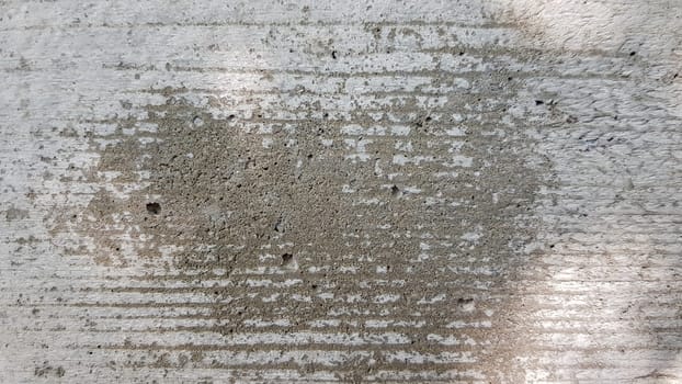 Beautiful concrete background with wood texture. Concrete wall flooring casing wood flooring texture. Mold traces for cement formwork