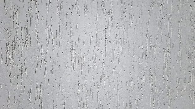 Texture of gray decorative plaster or concrete. Abstract background for design. Decorative plaster effect on wall