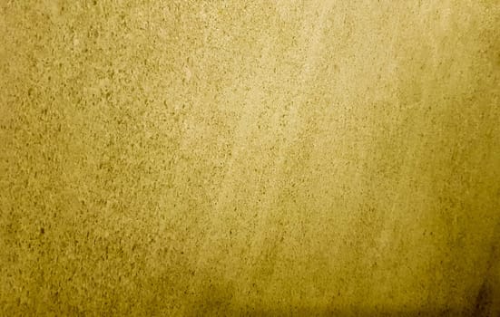 Gold background or texture and gradient shadow. wall and floor gold yellow mosaic tiles texture background. Metal texture background in gold.Panorama gold texture.