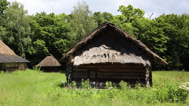Ukraine, Kiev - June 11, 2020. The old house of peasants in the museum Pirogovo. National Museum of Folk Architecture and Everyday Life of Traditional Folklore Houses of Different Regions of Ukraine.