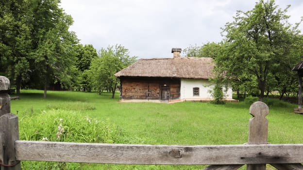 Ukraine, Kiev - June 11, 2020. The old house of peasants in the museum Pirogovo. National Museum of Folk Architecture and Everyday Life of Traditional Folklore Houses of Different Regions of Ukraine.