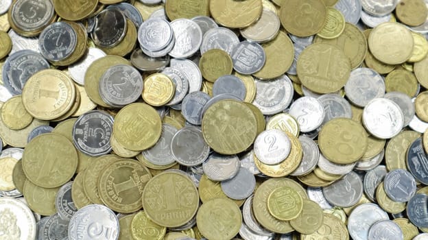 Many Ukrainian coins. National currency. Business concept. Ukrainian pennies. The concept of denomination of new and withdrawal of old coins