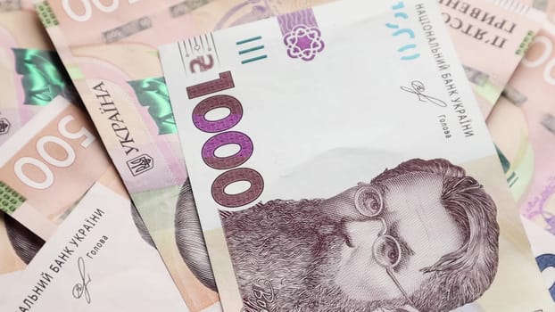 One paper bill of 1000 hryvnia. Portrait of Vladimir Ivanovich Vernadsky on the Ukrainian banknote. Ukrainian money. Money background.