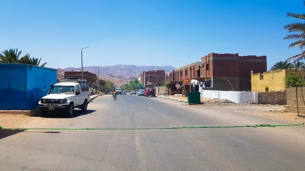 Egypt, Dahab - June 20, 2019: desert street. Egyptian residential buildings. The city of Dahab. surroundings of the spa town on a sunny day