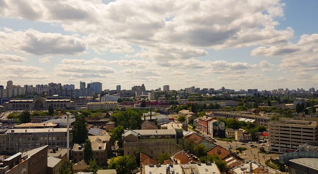 Aerial view of Kiev region with a modern city building mixed with historical, beautiful light at golden hour. City skyline of Kiev city from a bird's flight. Background image