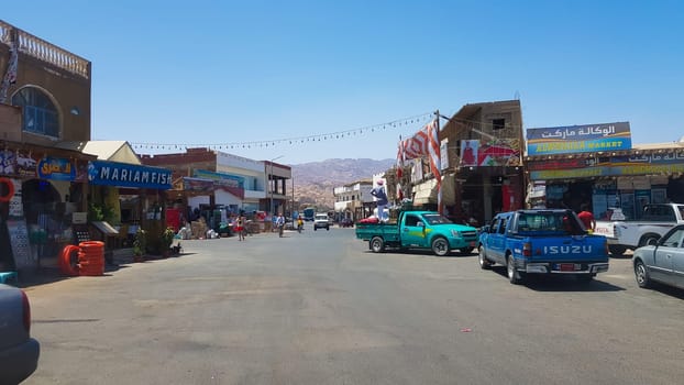 Egypt, Dahab - June 20, 2019: desert street. Egyptian residential buildings. The city of Dahab. surroundings of the spa town on a sunny day