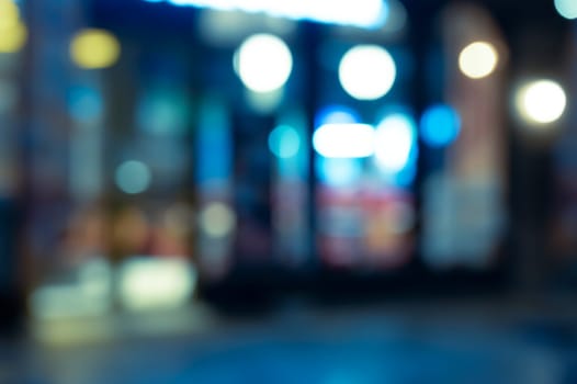 Abstract blur and defocused coffee shop and restaurant with coloful bokeh night lights for background