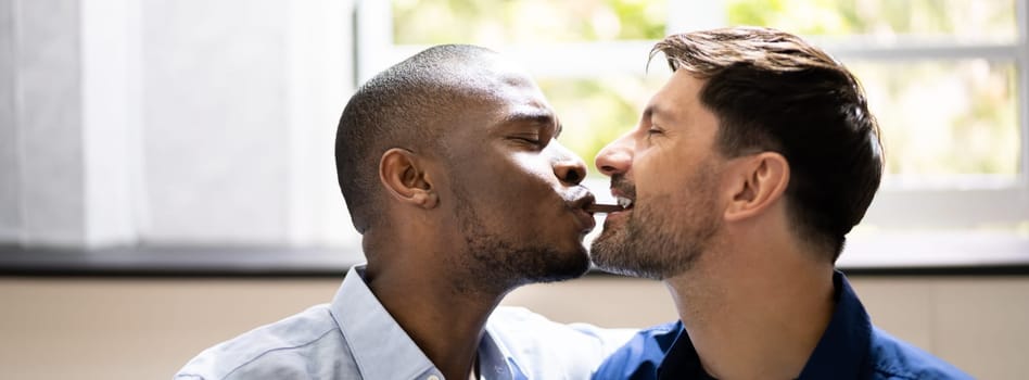 Romantic Date. Happy Gay Couple Sharing Snack